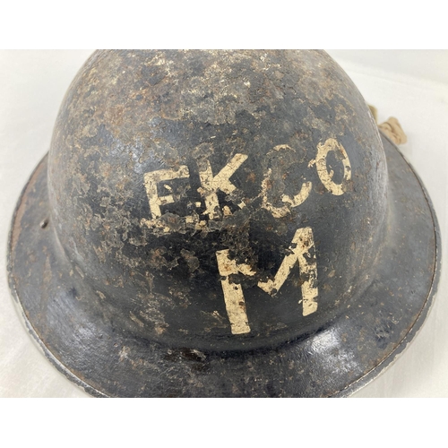 1117 - A British WWII Mk II steel Civil Defence Home Front helmet, painted black. Labelled EKCO for the EKC... 