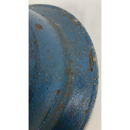 1120 - A WWII British Mk II steel helmet, painted blue. With red cross and rank marking for Corporal in RAF... 