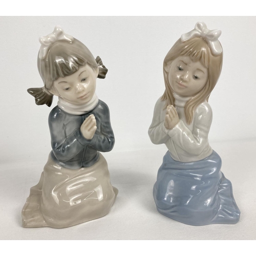 1145 - 2 x 1985 Nao Spanish ceramic figurines of girls praying. Tallest approx. 16cm tall.