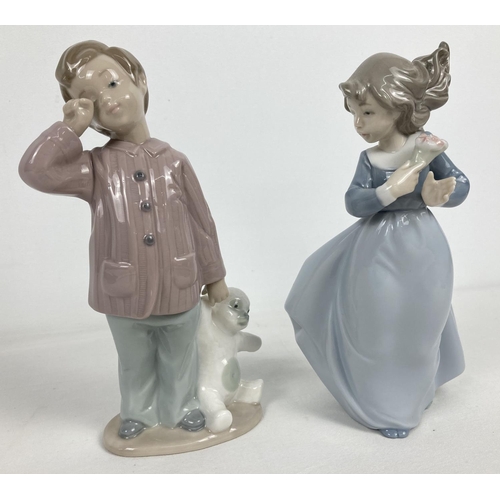 1148 - 2 retired Nao Spanish ceramic figurines. Sleepy Head from 1990 and a windswept girl holding a bunch ... 