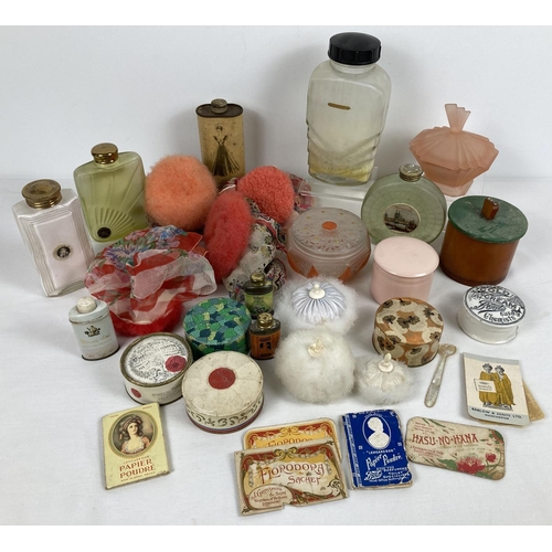 1274 - A collection of vintage vanity powder puffs, powder bottles and vanity jars. Lot also includes powde... 