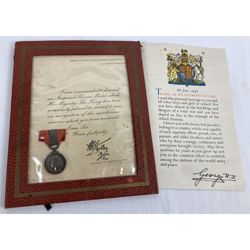 1125 - A WWII George VI Imperial Service Medal complete with original certificate (framed). Named to John S... 