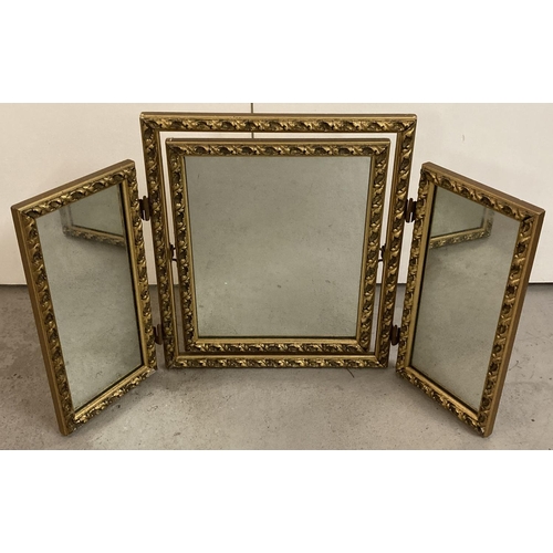 1305 - A vintage gilt framed folding triple dressing table mirror, with tilting central glass. Approx. 50cm... 