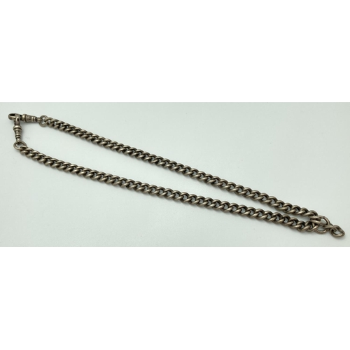 1067 - A vintage silver albert watch chain with lobster claw clasps. Both clasps marked and each curb chain... 