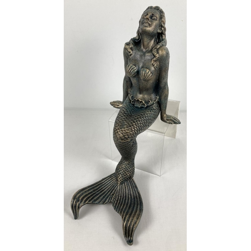 1100 - A large cast metal figurine of a mermaid in a seated position. Ideal pond ornament. Approx. 42cm tal... 