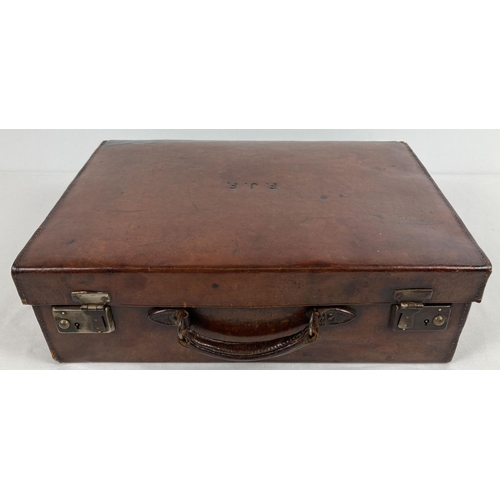 1313 - A vintage leather small suitcase/briefcase with leather carry handle and interior documents pocket. ... 