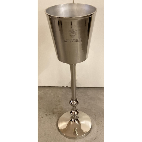 1076 - A large silver plated free standing Bollinger Champagne bucket on a turned pedestal base. Approx. 81... 