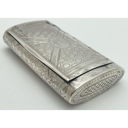 1085 - A Georgian silver rectangular cushion form snuff box By William Pugh. Engraved circular, cross and t... 