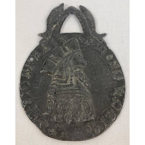 1334 - A medieval style lead medallion with kings heads to each side and wheatsheaf and fish detail to top.... 