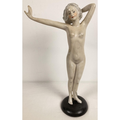 1167 - An Austrian Wien porcelain nude figurine on a black circular base. Hand painted detail to hair and f... 