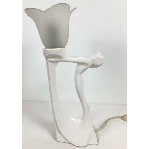 1169 - A modern Phoenix Pottery blanc de chine table lamp in an Art Deco style with a nude figure. Dated to... 