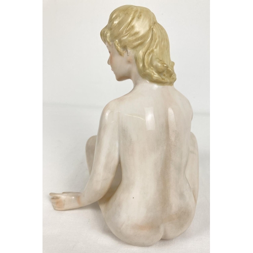 1170 - An Austrian Wien porcelain nude figurine of cross legged lady in an Art Deco style. With hand painte... 