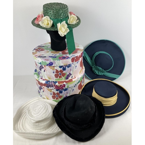 1283A - 2 modern hat boxes containing a collection of vintage 1980's  summer and occasion hats.