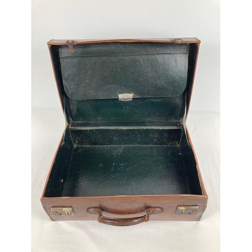 1313 - A vintage leather small suitcase/briefcase with leather carry handle and interior documents pocket. ... 