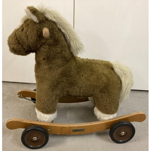 1230A - A modern Mamas and Papas Rock and Ride rocking horse. Adjustable wheel fixings to turn into a rockin... 