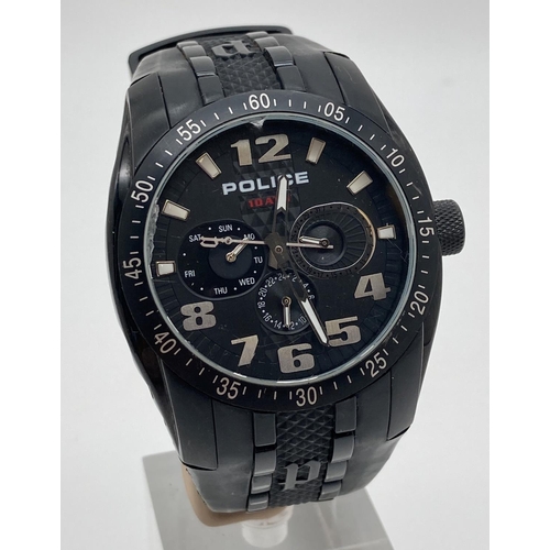 1168 - A Men's Topgear 12087J chronograph style wristwatch with black rubber strap by Police. Black face wi... 