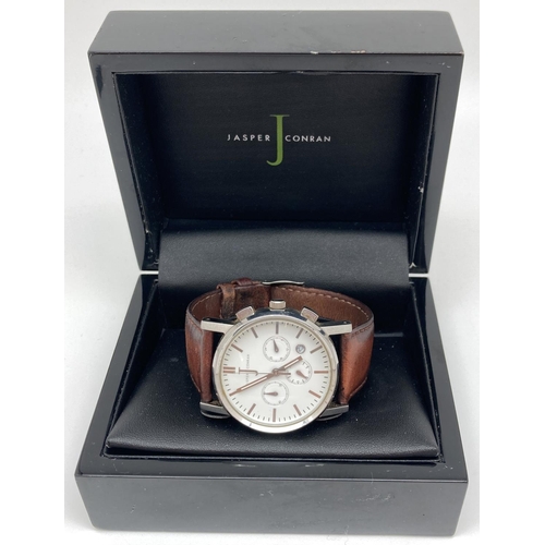 1171 - A boxed Jasper Conran 1081-80 PH13563 men's chronograph wristwatch with brown leather strap. White f... 