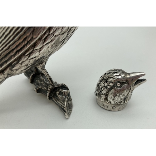 1187 - A late 19th Century German Silver large novelty pepper in the form of a songbird on a branch. With m... 