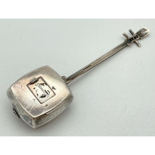 1190 - A novelty silver shaker in the form of a 3 stringed Japanese Shamisen. Marked to reverse 'Silvercraf... 