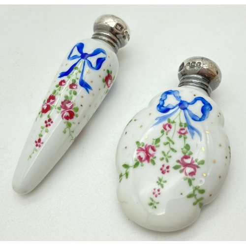 1191 - 2 early 20th century ceramic scent bottles with hallmarked silver screw top lids. Shaped bottles fea... 