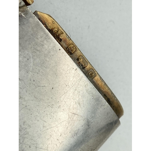 1192 - An Edwardian silver curve backed vesta case hallmarked for G. Loveridge, B'ham 1902. With hanging ba... 