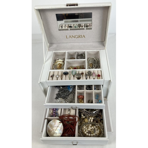 1064 - A white faux leather Langria jewellery box and contents with carry handle, pull out drawers and mult... 