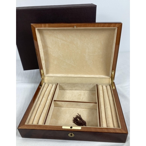 1066 - A new and boxed red Birdseye maple jewellery box by Walwood. Cream velveteen lining with ring/earrin... 