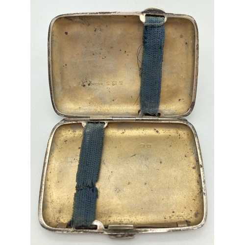 1197 - A small curve backed silver cigarette case with engraved monogram to top corner. Hallmarked for Birm... 