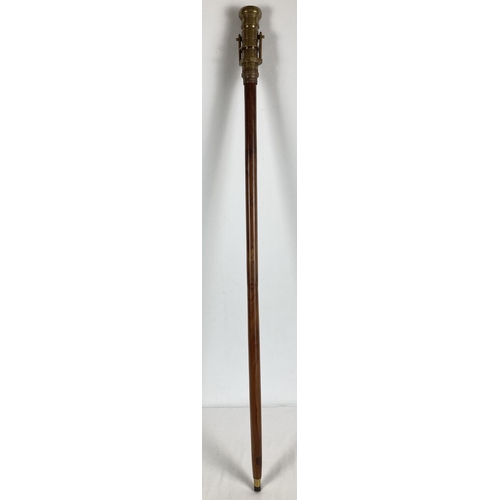 1363 - A reproduction wood and brass walking stick with swivel top telescope/compass handle. Approx. 95.5cm... 