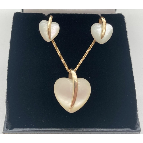 1088 - A modern 9ct gold and mother of pearl necklace and matching earrings. Heart shaped mother of pearl p... 