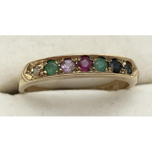 1110 - A 9ct gold Dearest eternity band set with 7 gemstones. Fully hallmarked inside band. Ring size P½.