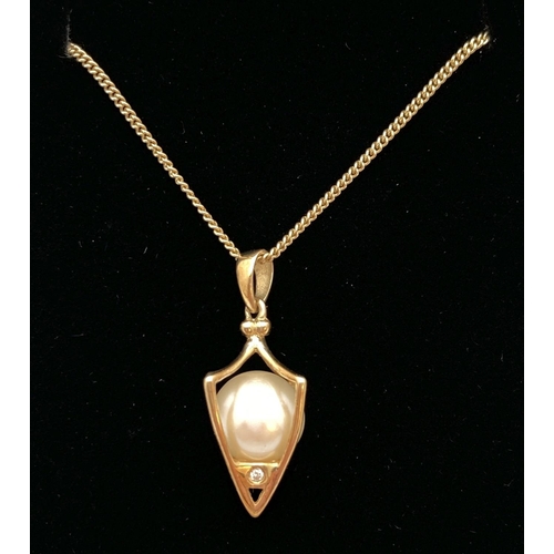 1122 - A 9ct Clogau Welsh gold pendant of a caged pearl set with small emeralds & diamonds. On original 9ct... 