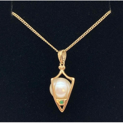 1122 - A 9ct Clogau Welsh gold pendant of a caged pearl set with small emeralds & diamonds. On original 9ct... 