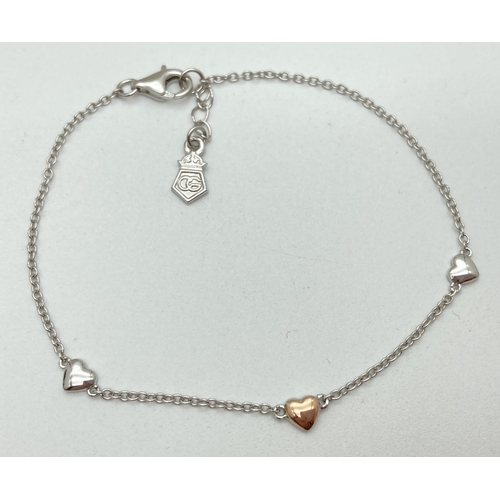 1141 - A boxed Clogau Welsh Silver bracelet with 3 small heart shaped links. Marked 925 to lobster claw cla... 