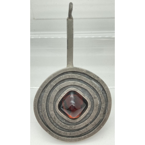 1151 - A mid century Jorge Jensen Danish, Modernist design pewter pendant. With central amber coloured ston... 