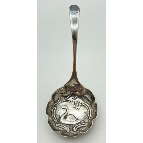 1199 - A Victorian Dutch silver ladle with embossed swan decoration to bowl. Hallmarked to back of handle w... 