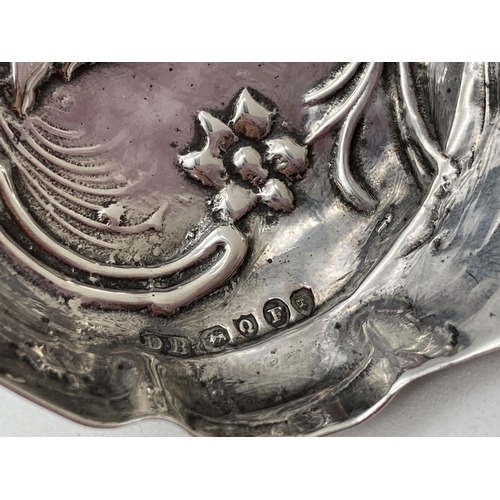 1199 - A Victorian Dutch silver ladle with embossed swan decoration to bowl. Hallmarked to back of handle w... 