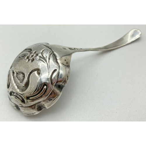 1199 - A Victorian Dutch silver ladle with embossed swan decoration to bowl. Hallmarked to back of handle w... 