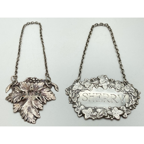 1210 - A vintage silver sherry decanter label together with a white metal rum label. Both with vine leaf de... 