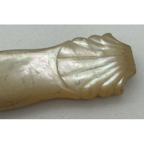 1212 - An early Victorian silver butter knife with mother of pearl handle. With decorative silver mount and... 