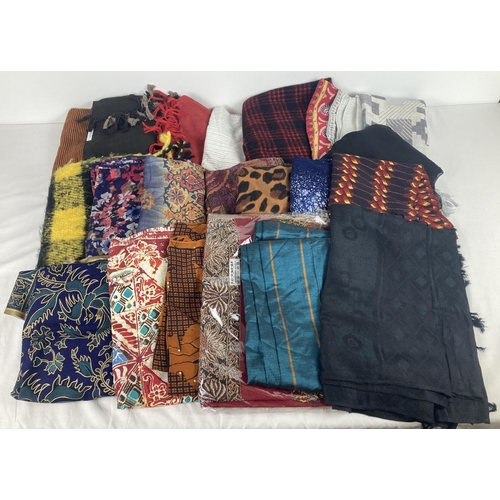11 - A collection of 20 modern pashmina style scarves in a variety of prints and styles.