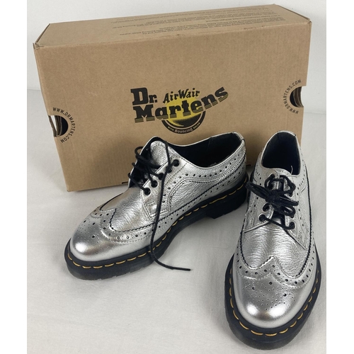 1 - A pair of Dr Martens Kiltie metallic brogue shoes in silver santos leather. With removable kiltie to... 