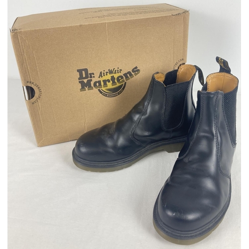 18 - A pair of boxed Dr Martens black smooth leather Chelsea boots, 2976. Size 4. In lightly worn conditi... 