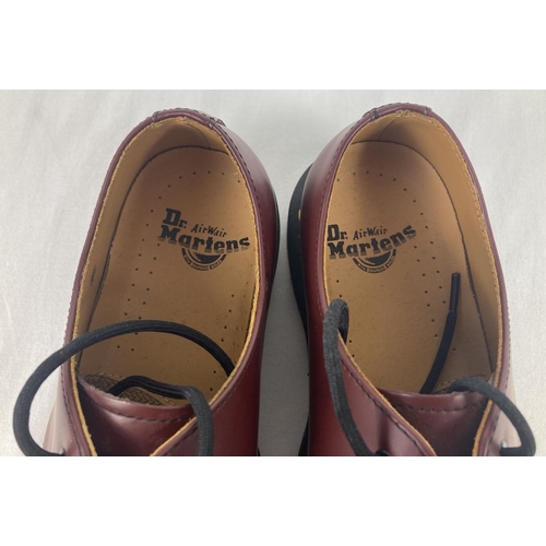 20 - A pair of unboxed Dr Martens smooth Cherry red leather shoes, 1461, with yellow stitching. Size 5. I... 