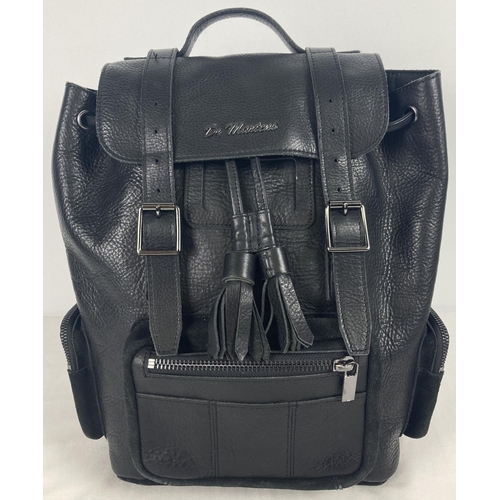 26 - A Dr Martens black leather backpack with zipped pockets and suede detail. Cotton lined interior with... 