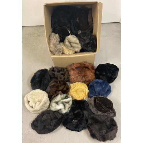 36 - A large box of assorted vintage real & faux fur hats and bonnets in various colours.