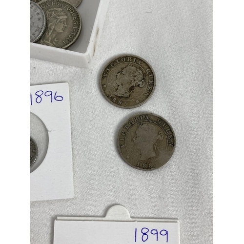 6 - A collection of antique and vintage British, foreign and Empire country coins. To include: Victorian... 