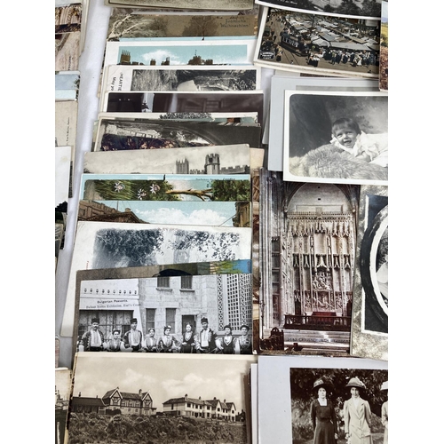 291 - A collection of approx. 350 assorted Edwardian & vintage postcards & greetings cards.