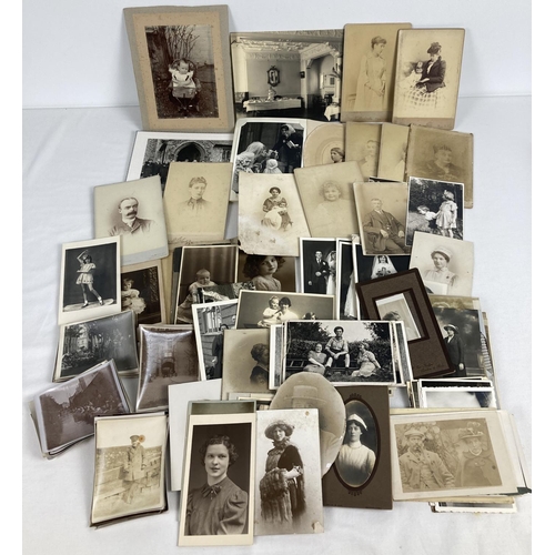 157 - A collection of assorted Victorian & vintage photographs and cabinet cards. To include studio portra... 