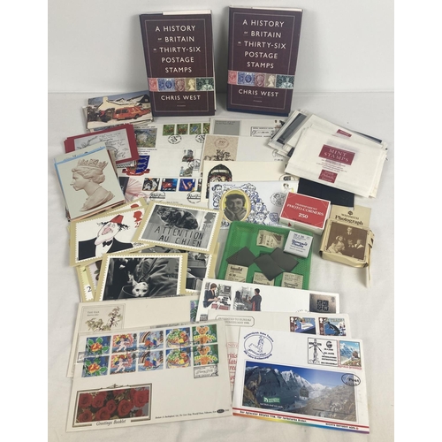 69 - A collection of philately related items. To include an assortment of first day covers, 2 copies of 